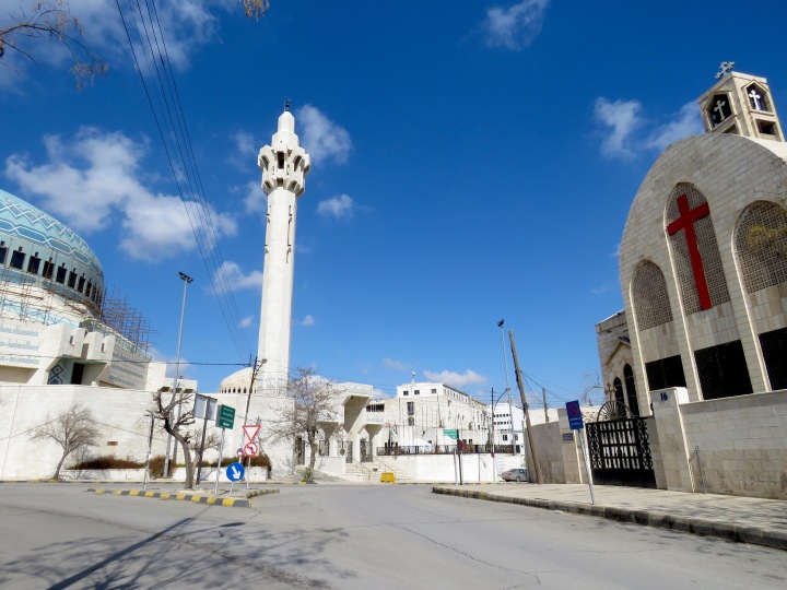 King Abdullah Mosque sits right across from a Greek Orthodox Church in Amman, Jordan