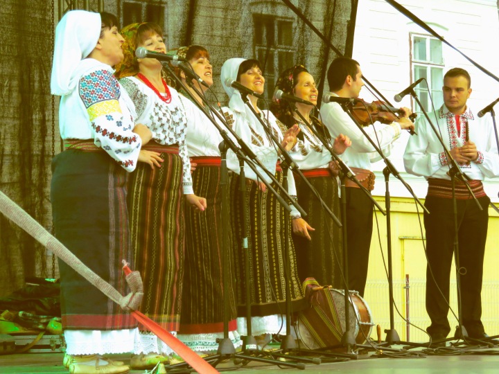 Folk Singers performing on opening night of Sibiu's International Film Festival - by Anika Mikkelson - Miss Maps - www.MissMaps.com