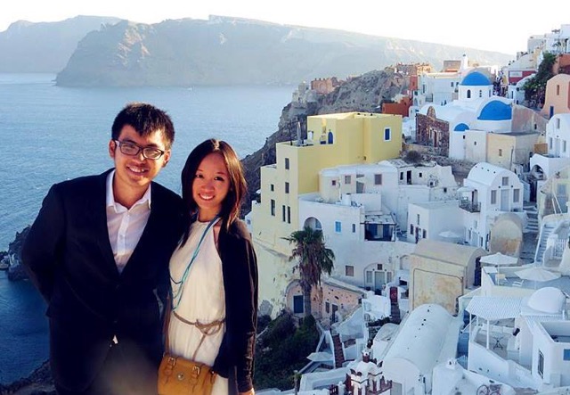 It was his (Anthony's) graduation trip. Santorini, Greece seems to be a popular venue for wedding parties. A bridesmaid helped us to take this photo - by Vivian IG: littlemisshappyfeet - MissMaps.com Featured Female Traveler